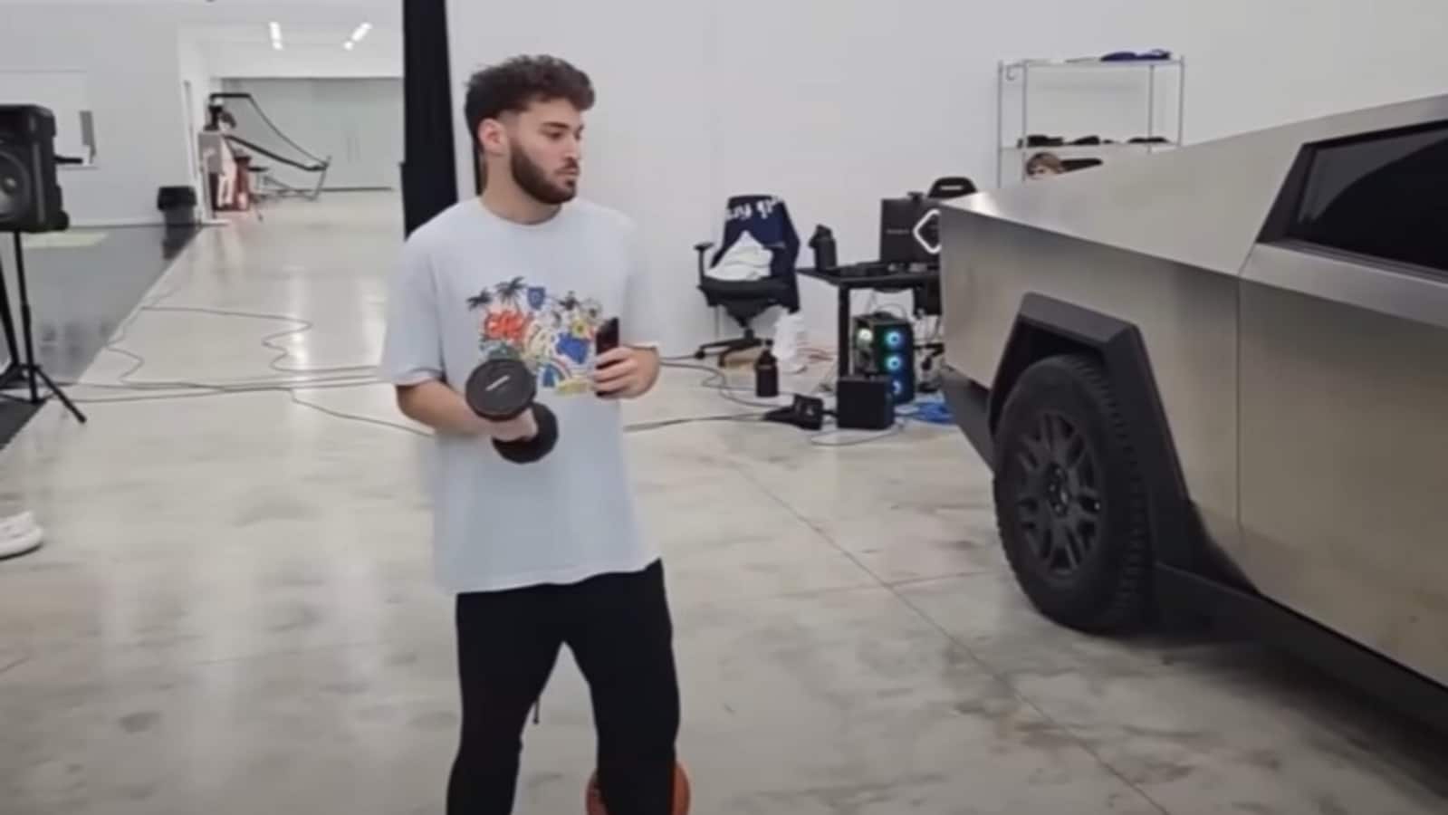 Adin Ross throws a dumbbell at his Tesla Cybertruck, here’s what happened next